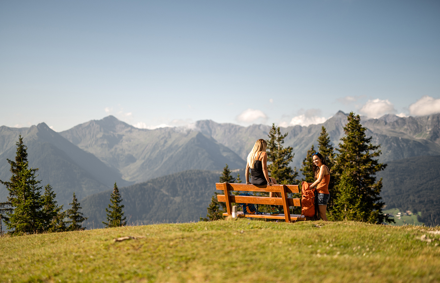 Couple with bike equipment looking at the horizon